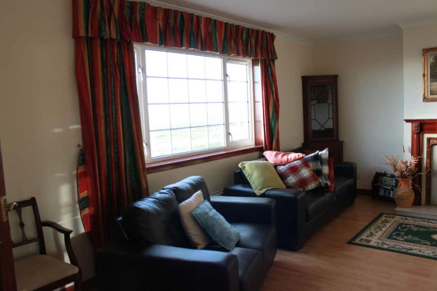 Large bungalow with spectacular views over Stornoway, the Minch and mainland.