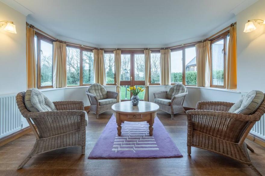 A beautifully furnished house offering large, luxury accommodation.