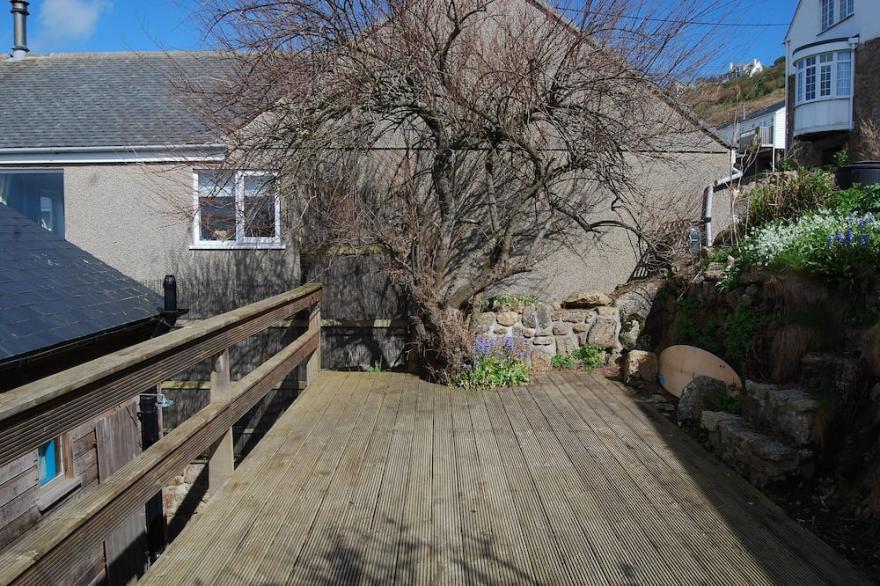 Thatched Cottage With Sea Views Situated Just Yards From The Beach