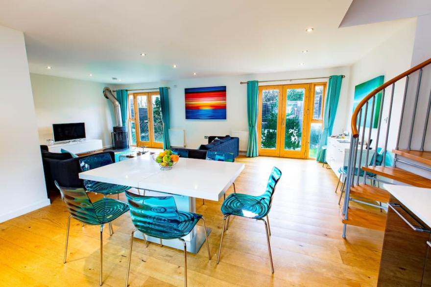 Gorgeous home known as the Sky Deck due to its innovative design with large terrace on the roof allo