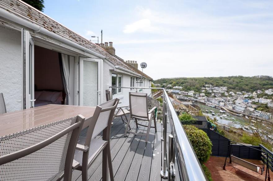 Lovely house with balcony, deck and river views.