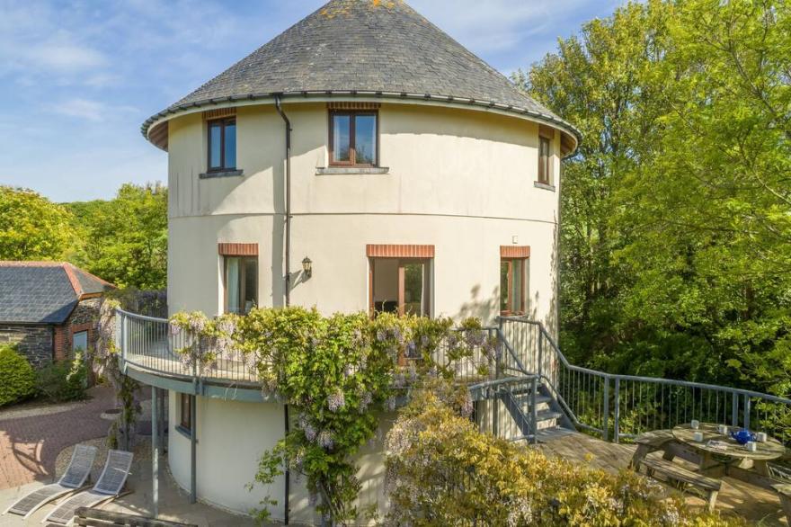 The Roundhouse has an unusual design and stands alone overlooking the lakes.