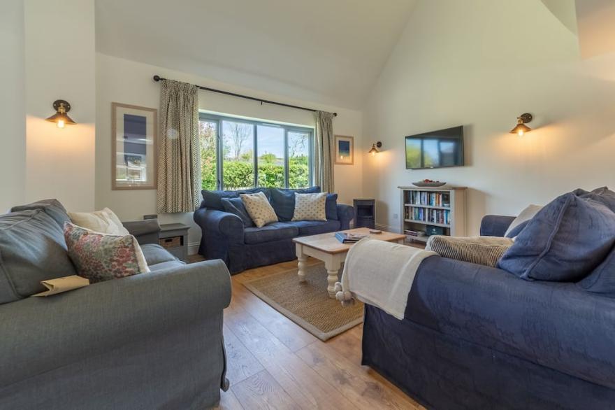 A stunning holiday home located in the Curved Stables at Roserrow.