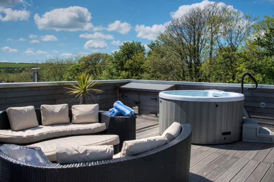 Fabulous property with extensive roof terrace, reached by a spiral staircase, affords panoramic view