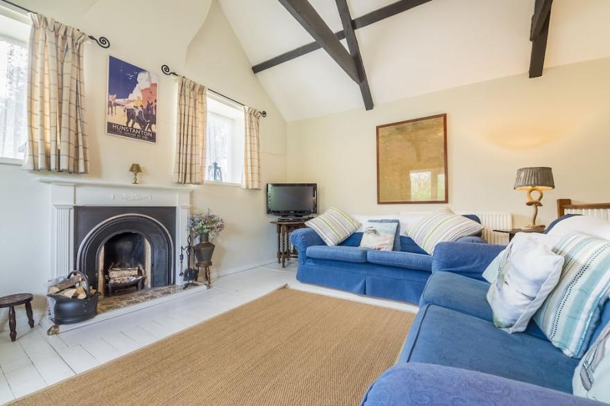 Gorgeous and charming brick and flint cottage
