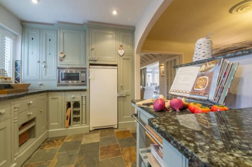 A luxuriously refurbished single-storey property in central Brancaster.