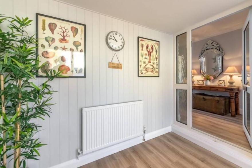 This large luxury coastal themed property is a true seaside haven.