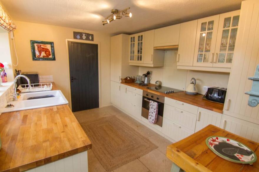 A renovated and beautifully decorated character cottage with underfloor heating.