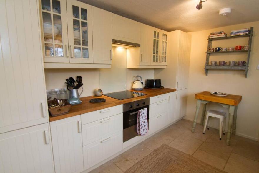 A renovated and beautifully decorated character cottage with underfloor heating.