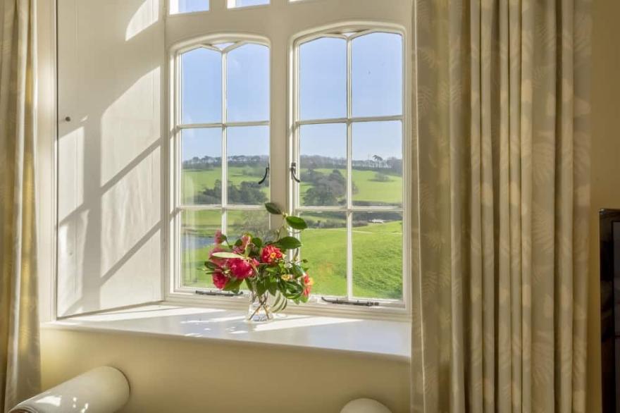 Spacious, self contained flat within this Historic Castle of Caerhays, within walking distance of th