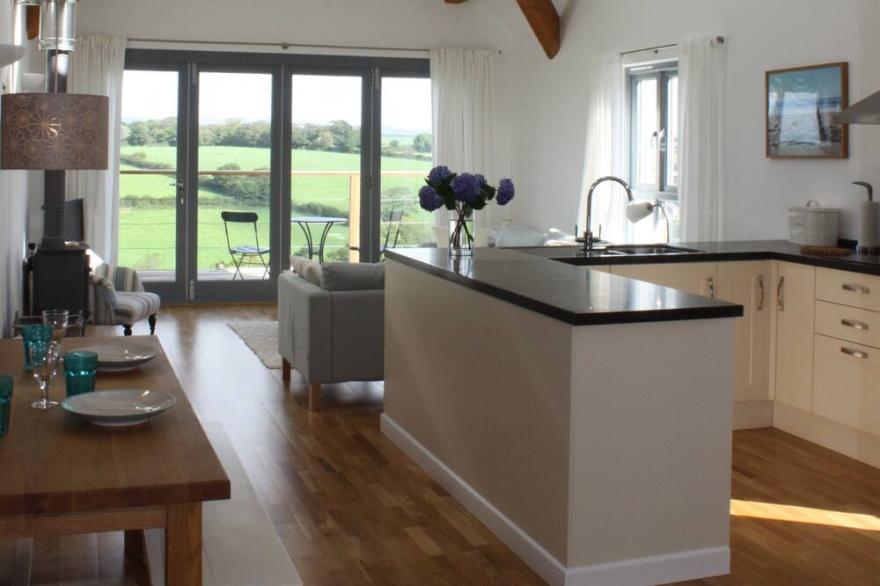 Light Airy Modern Cottage: comfortable interior, village centre, great local pub