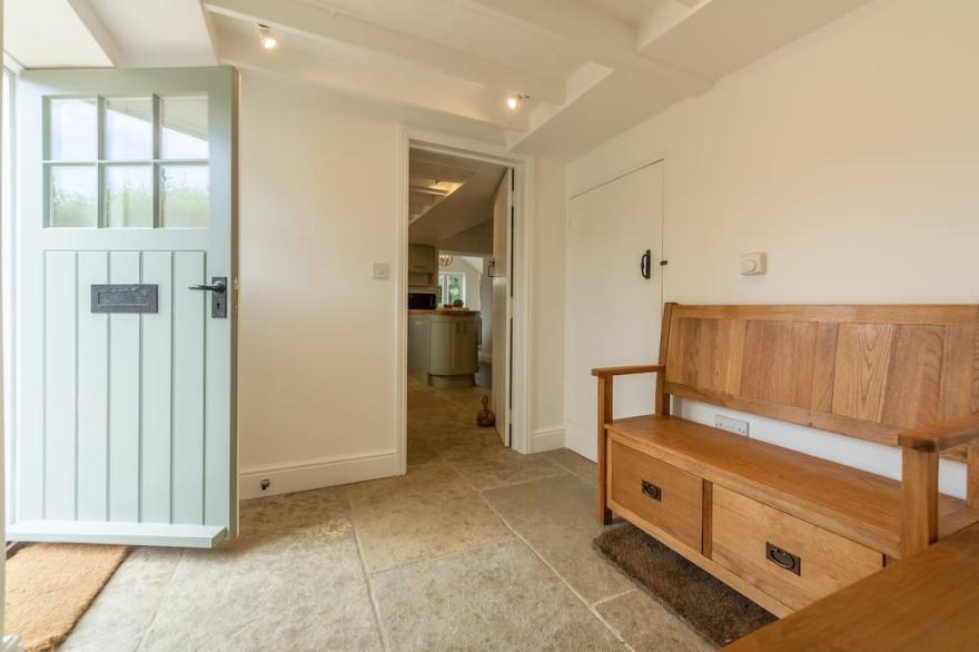 This property has been transformed into a spacious and relaxing coastal home.