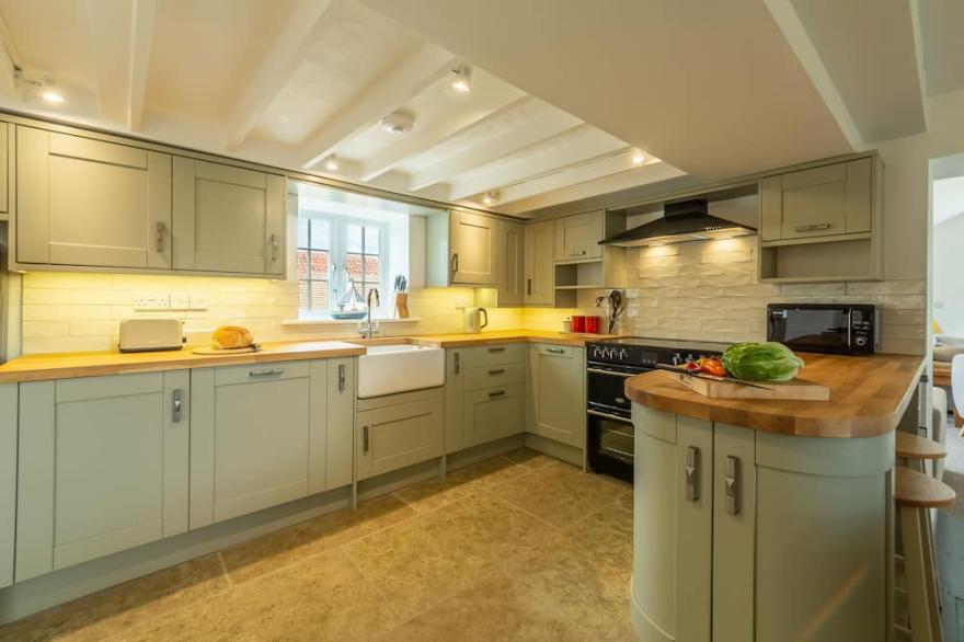 This property has been transformed into a spacious and relaxing coastal home.